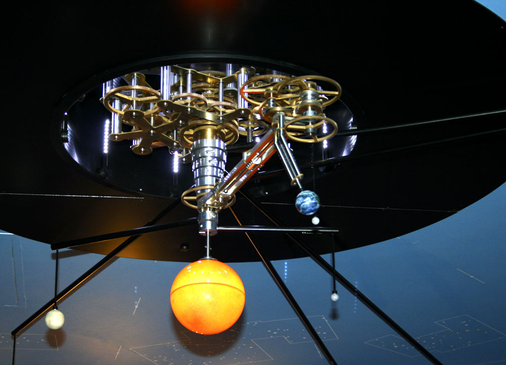 Close up of a mechanical orrery